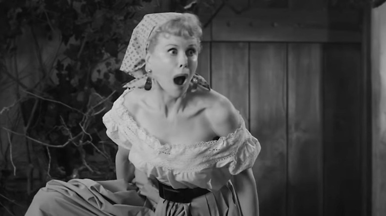 Nicole Kidman as Lucille Ball with a goofy expression on her face in an episode of I Love Lucy in Being the Ricardos