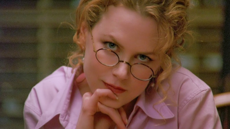 Nicole Kidman as Alice looking seductive and wearing glasses in Eyes Wide Shut