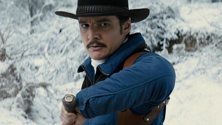 Agent Whiskey (Pedro Pascal) draws his upgraded whip in Kingsman: The Golden Circle