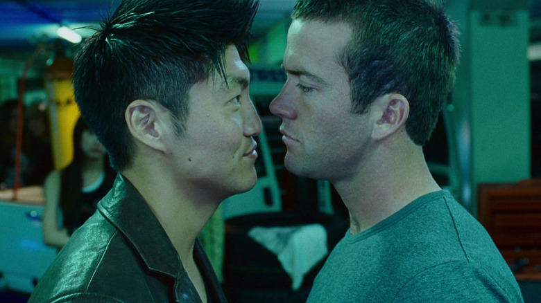 Takashi (Brian Tee) and Sean Boswell (Lucas Black) square off in The Fast and the Furious: Tokyo Drift