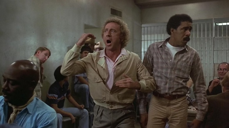 Skip Donahue (Richard Pryor) and Harry Monroe (Gene Wilder) shout in a holding cell in Stir Crazy