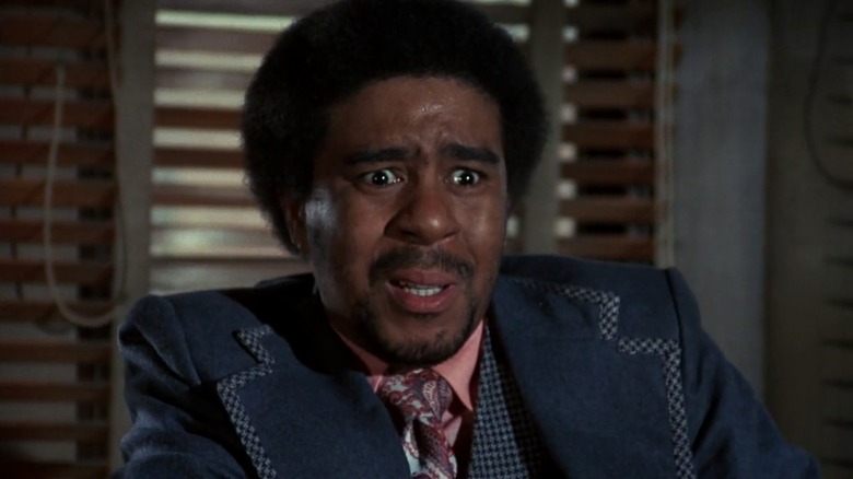 Sharp Eye Washington (Richard Pryor) looks incredulous in his office in Uptown Saturday Night