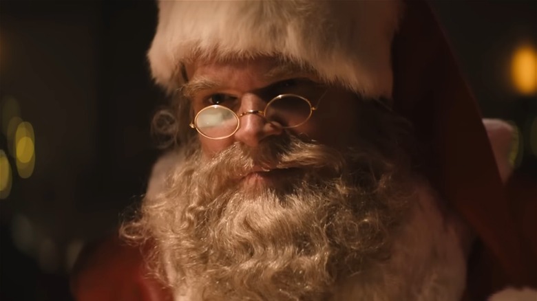 David Harbour as Santa with glasses
