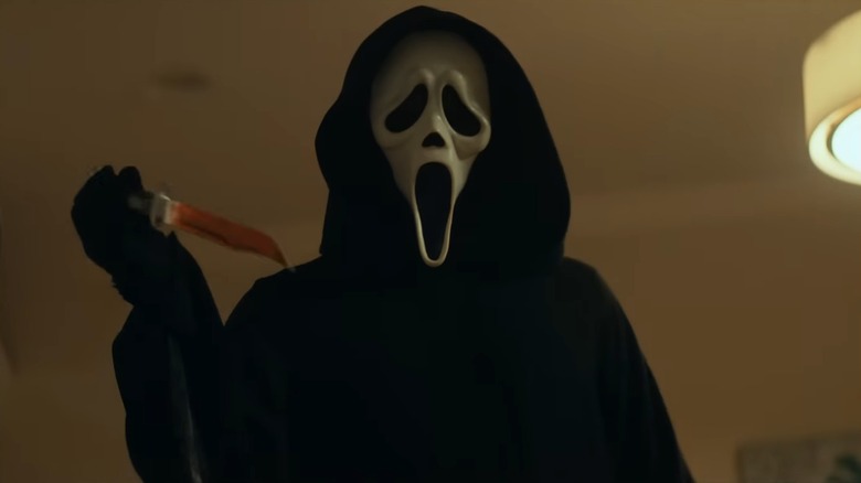 The Ghostface Killer from Scream, holding a bloody knife