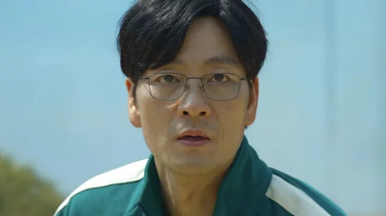 Park Hae-soo's Cho Sang-woo wearing glasses on Squid Game