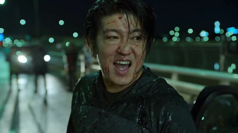 Heo Sung-tae's Jang Deok-su laughing on Squid Game