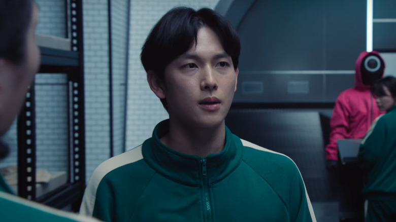 Im Si-wan's Lee Myung-gi wearing green jumpsuit on Squid Game