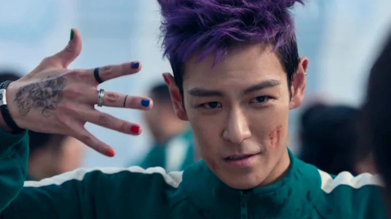 Choi Seung-hyun's Thanos with purple hair on Squid Game