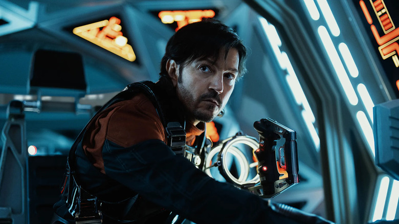 Cassian Andor (Diego Luna) looks up from a cockpit in Andor