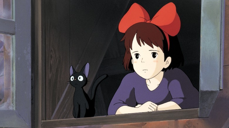 Kiki and Jiji at the window
