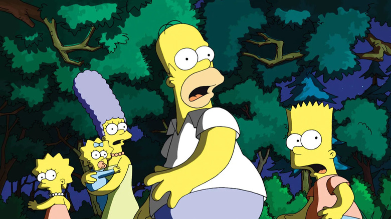 Homer, Marge, Lisa, Bart, and Maggie looked surprised as light shines on them in the woods in The Simpsons