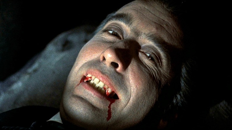 A wry bloodied smile from Count Dracula