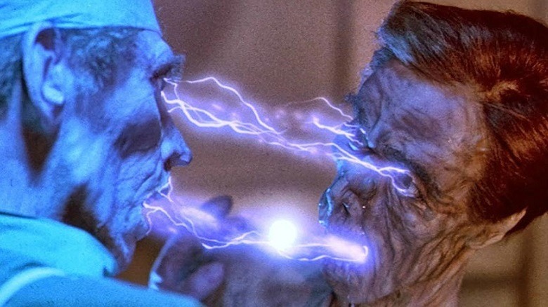 One of the lifeforce vampires drains energy from his doctor