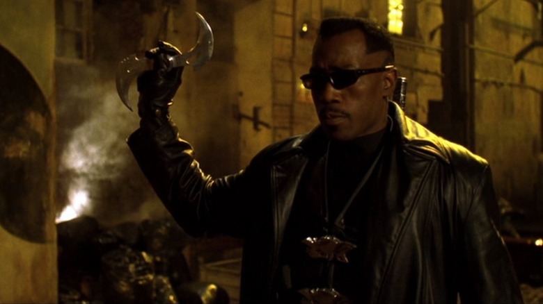 Wesley Snipes as Blade, showing off cool weapons in Blade II