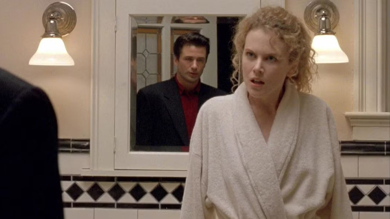 Alec Baldwin as Jed and Nicole Kidman as Tracy, arguing in Malice