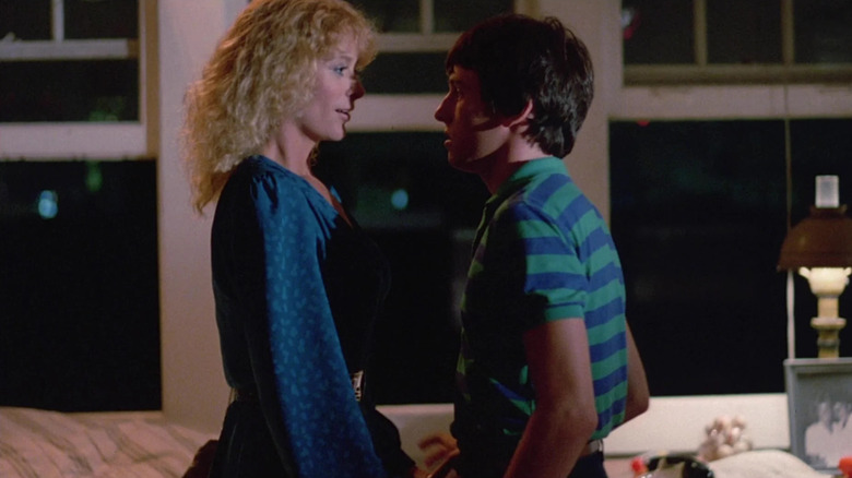 Sybil Danning as Diane and Eric Brown as Jay, crossing the line in They're Playing with Fire