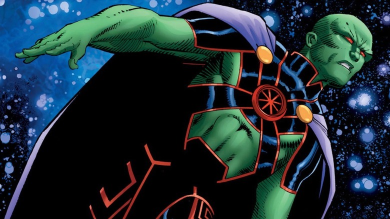 Martian Manhunter flies through outer space on the cover of Martian Manhunter (vol. 4) #15