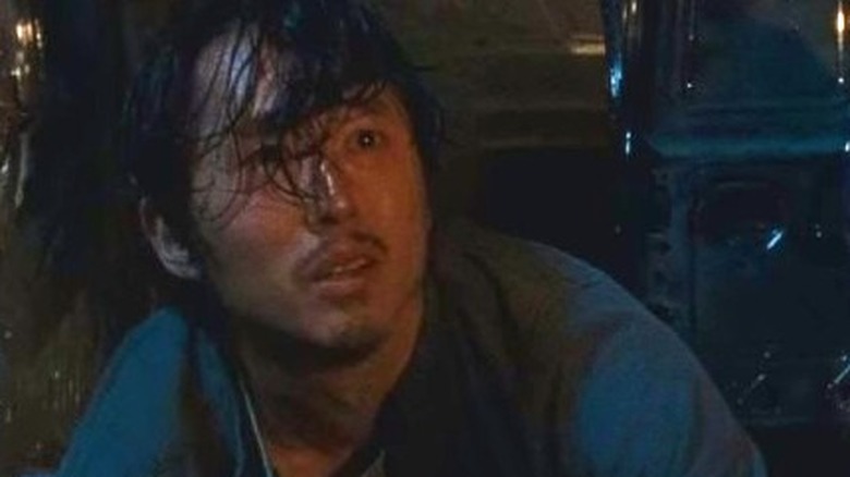 Glenn on hands and knees