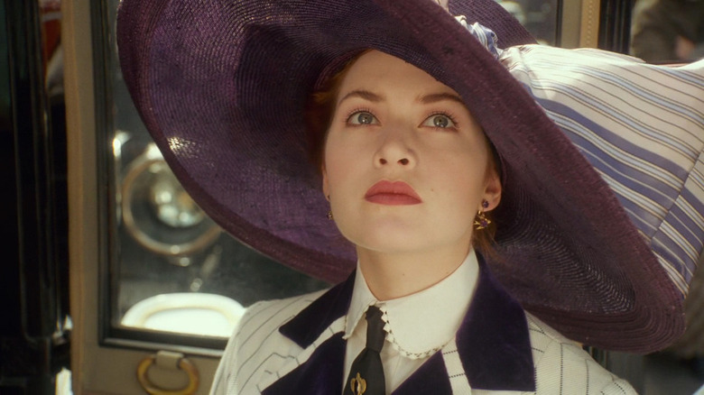 Titanic's Rose looking up wearing big purple hat