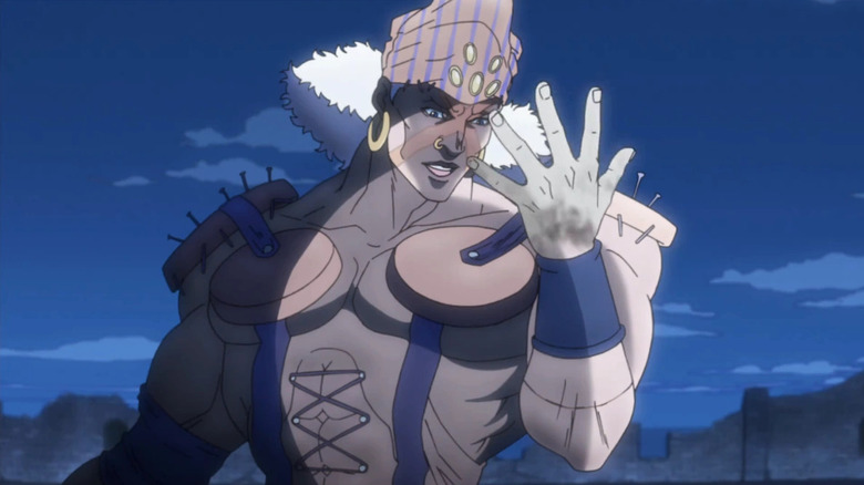 Esidisi glances at his hand in JoJo's Bizarre Adventure