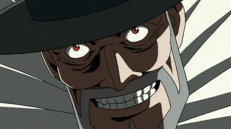 Mad Pierrot stares up grinning menacingly in Cowboy Bebop
