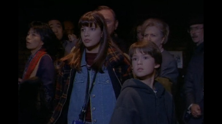 Sue (Kathryn Short) and Eddie (Corey Sevier) lead a group of tourists in Goosebumps (1995)