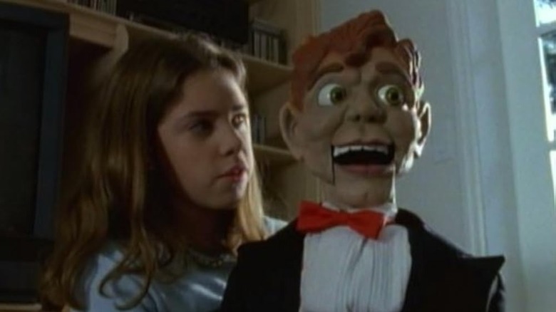 Amy Kramer (Maggie Castle) holds Slappy (Cal Dodd) in Goosebumps (1995)