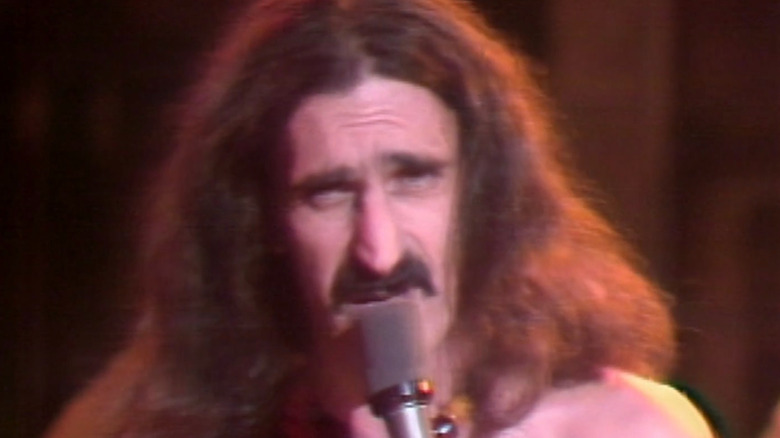 Frank Zappa singing into microphone on Saturday Night Live
