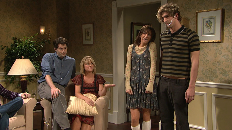 Michael Phelps wearing headgear during a Saturday Night Live sketch
