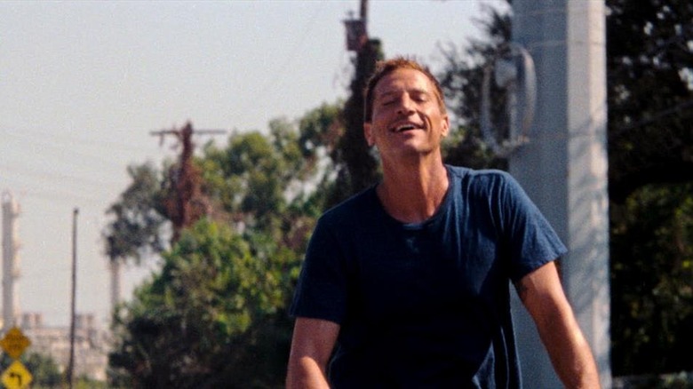 Simon Rex rides bike