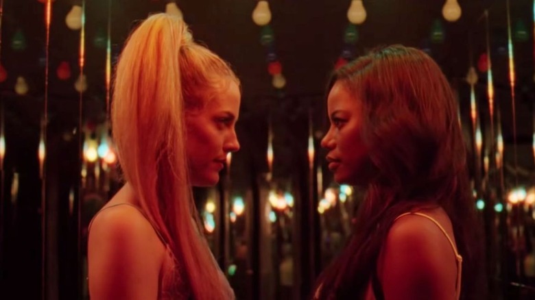 Stefani and Zola stare at each other