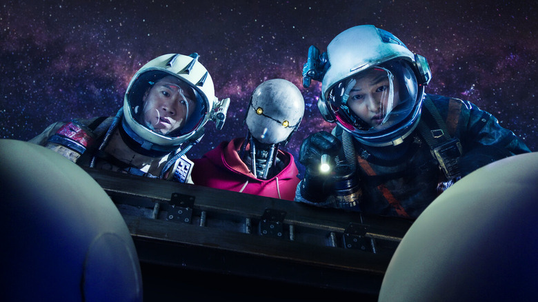 The Space Sweepers check an abandoned ship