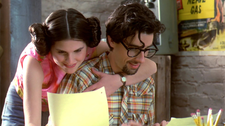 Martin Hynes as George Lucas being hugged by Lisa Jakub as Marion