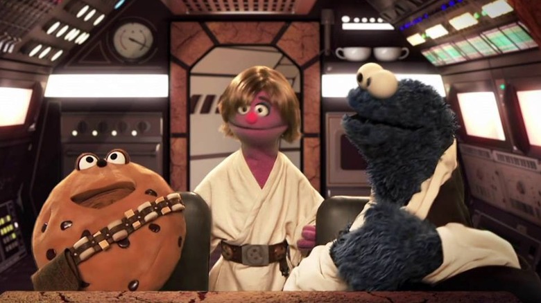 Cookie Monster as Flan Solo with a cookie as Chewie and Luke Piewalker in Star S'Mores