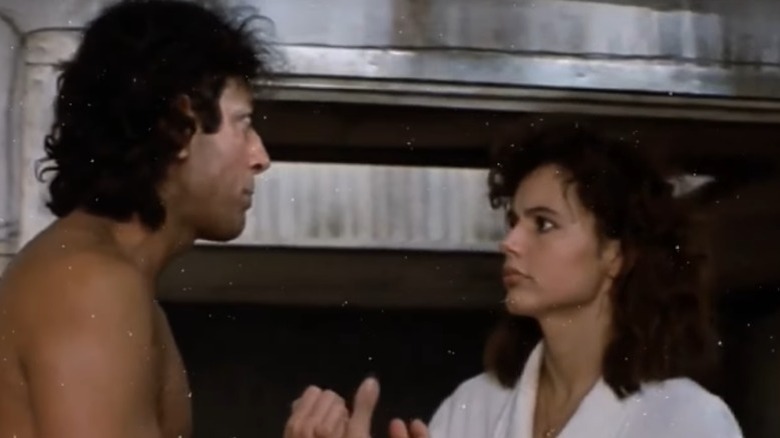Geena Davis and the Brundlefly in The Fly