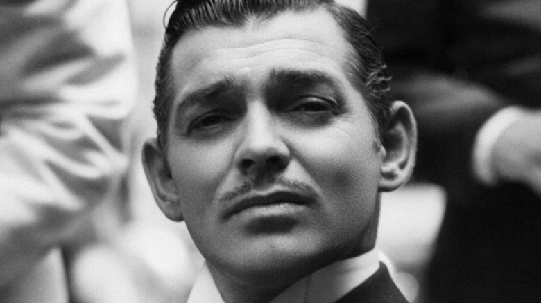 Clark Gable poses for a photo