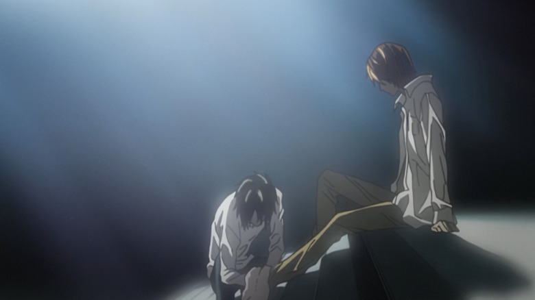 L washes Light's feet