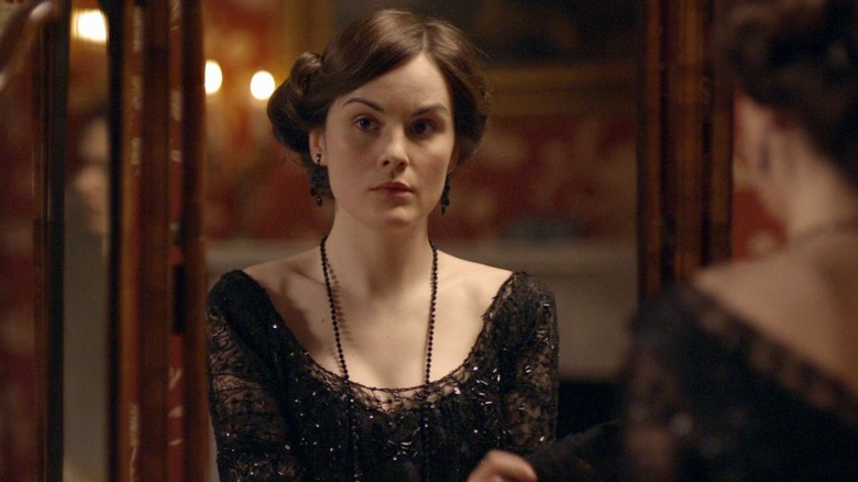 Lady Mary sitting Downton Abbey