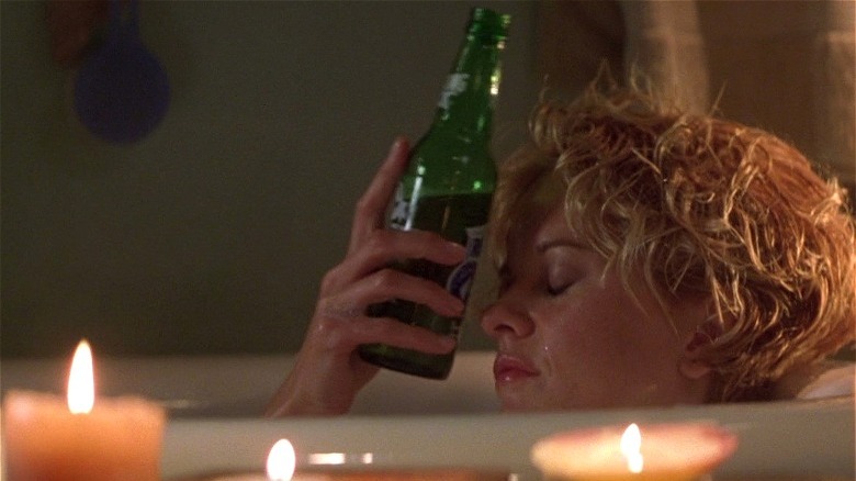 City of Angels Maggie drinks while bathing