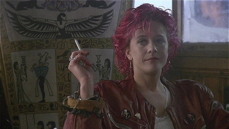Promised Land Bev smokes a cigarette