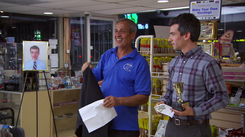 Nathan Fielder holding trophy Nathan for You