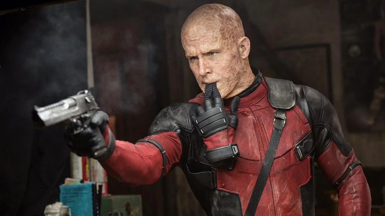 Ryan Reynolds pointing gun