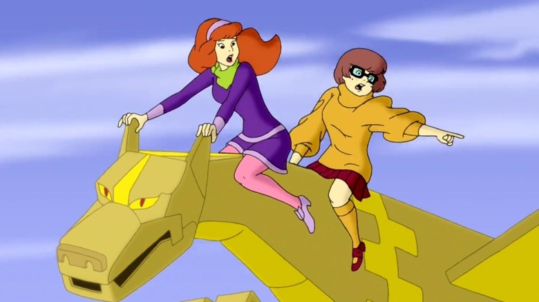 Daphne and Velma, golden dragon creature