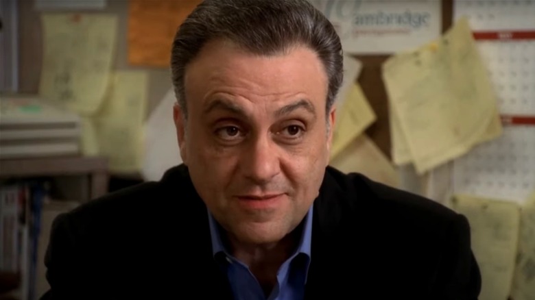 Johnny Sack in black suit