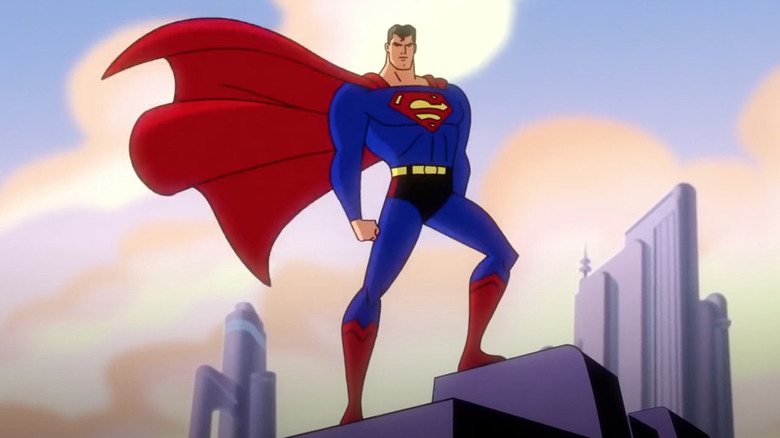 Superman rips off suit next to series logo