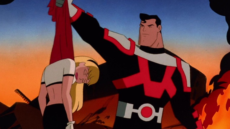 Brainwashed Superman holds Supergirl's lifeless body