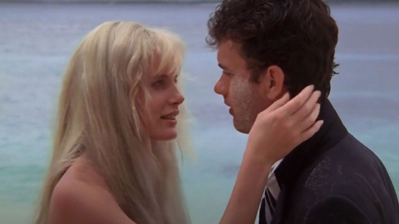 Daryl Hannah and Tom Hanks on beach