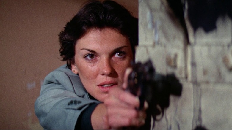 Kate Moore firing weapon
