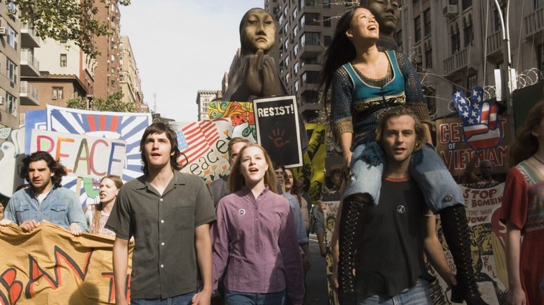 The main characters march against the Vietnam War