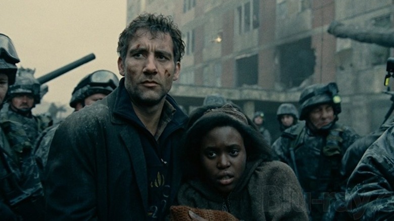 Clive Owen protects an expectant mother